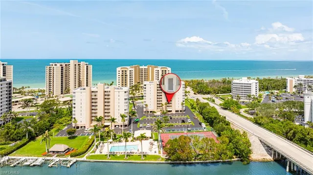 a view of swimming pool with seating area
