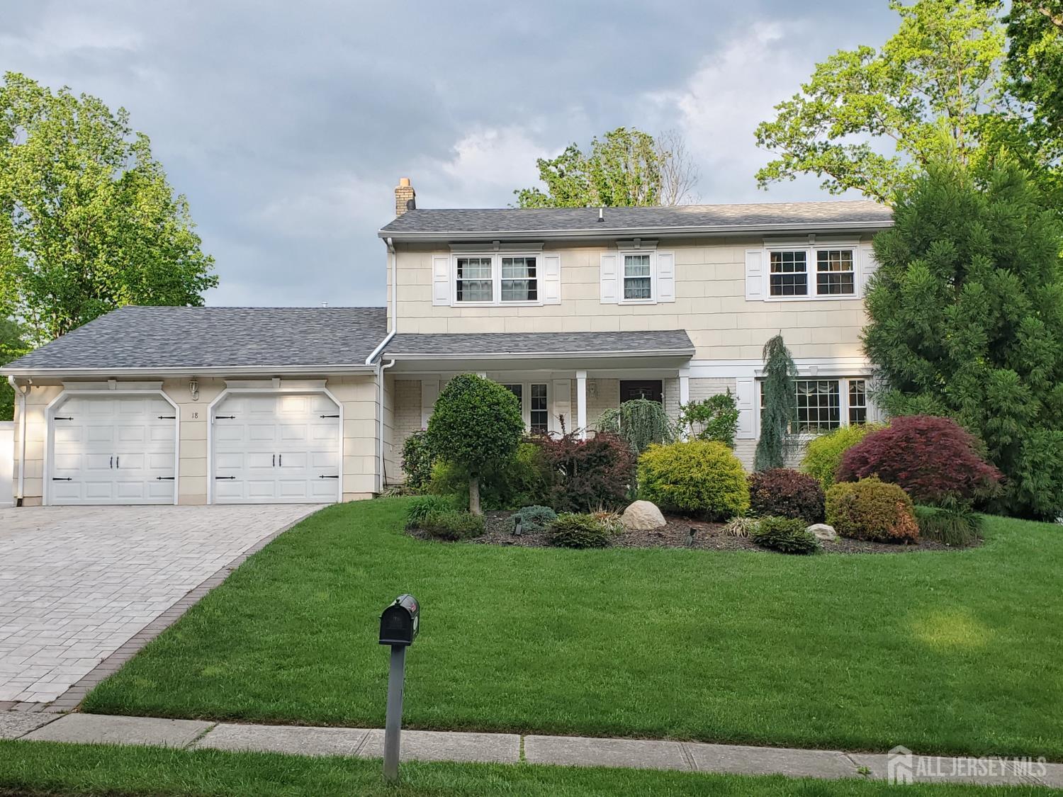 18 Timber Road East Brunswick, NJ 08816 - Photo 1 of 38 a front view of a house with garden
