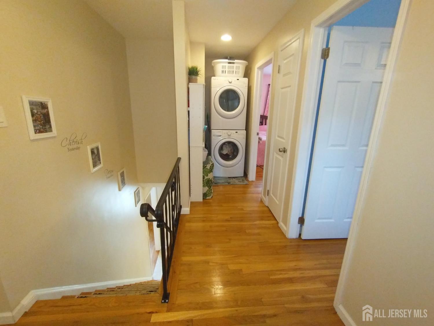 18 Timber Road East Brunswick, NJ 08816 - Photo 18 of 38 a view of a hallway with wooden floor