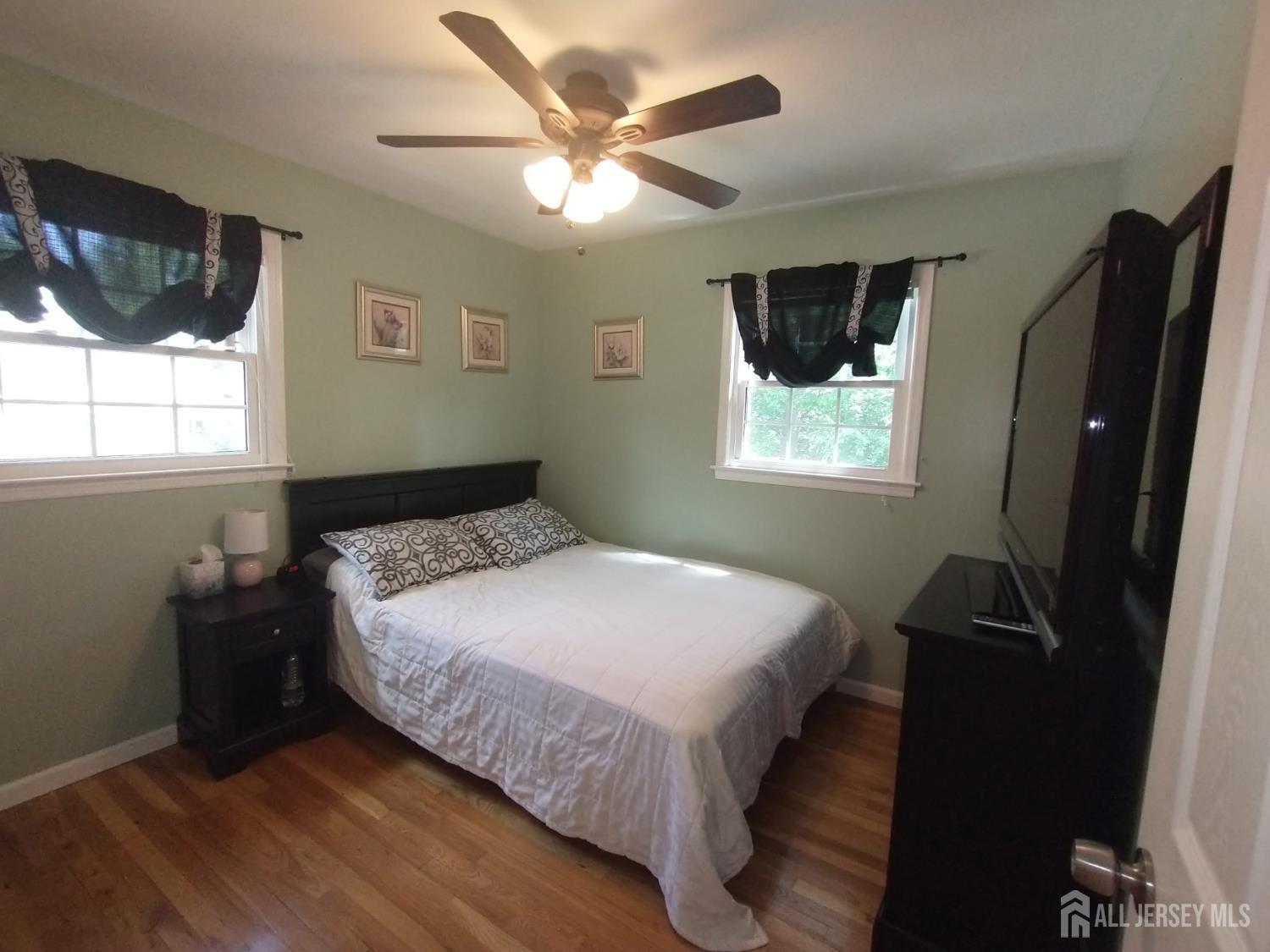 18 Timber Road East Brunswick, NJ 08816 - Photo 23 of 38 a bedroom with a bed and a window