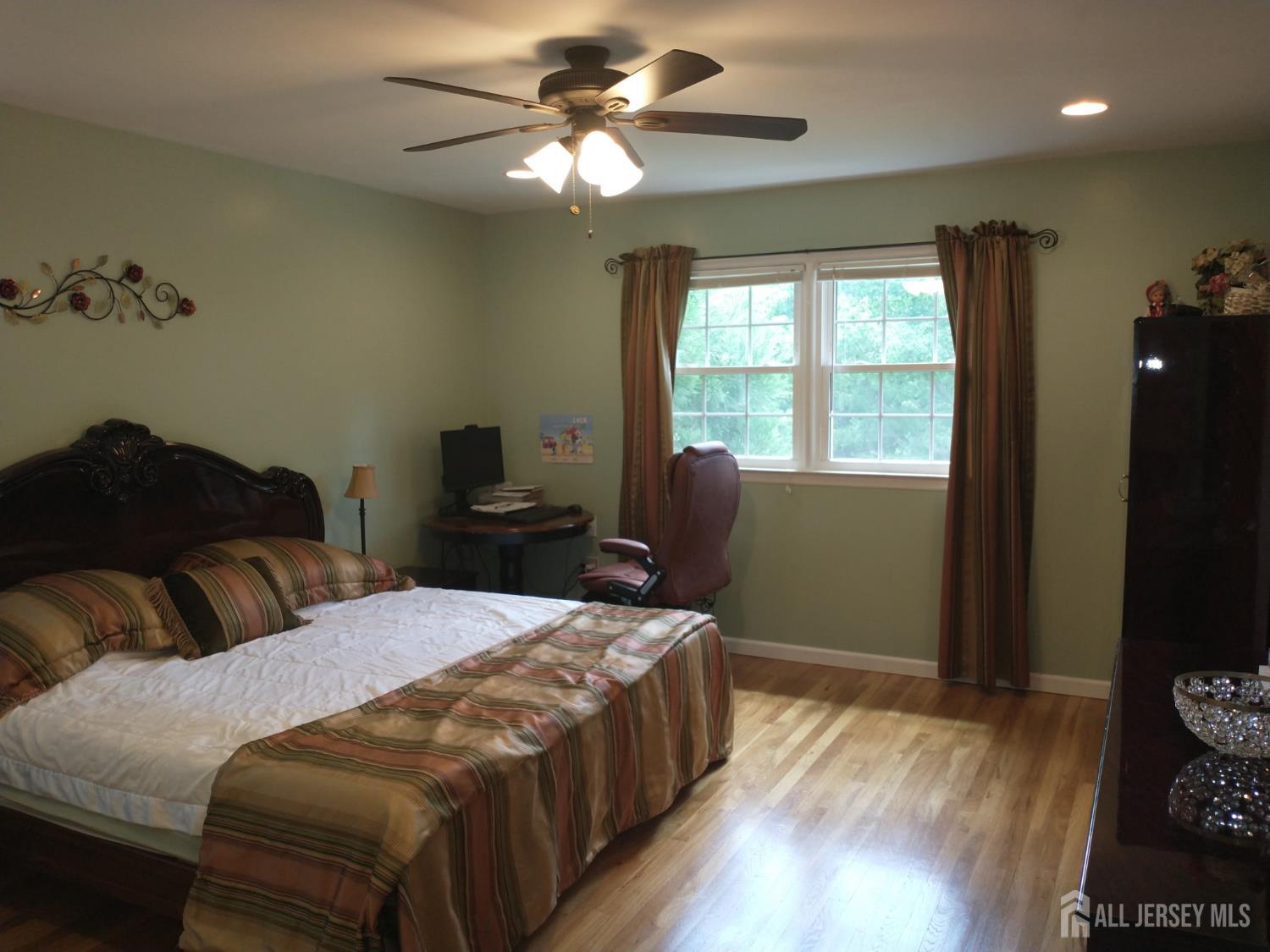 18 Timber Road East Brunswick, NJ 08816 - Photo 25 of 38 a bedroom with a bed and a window