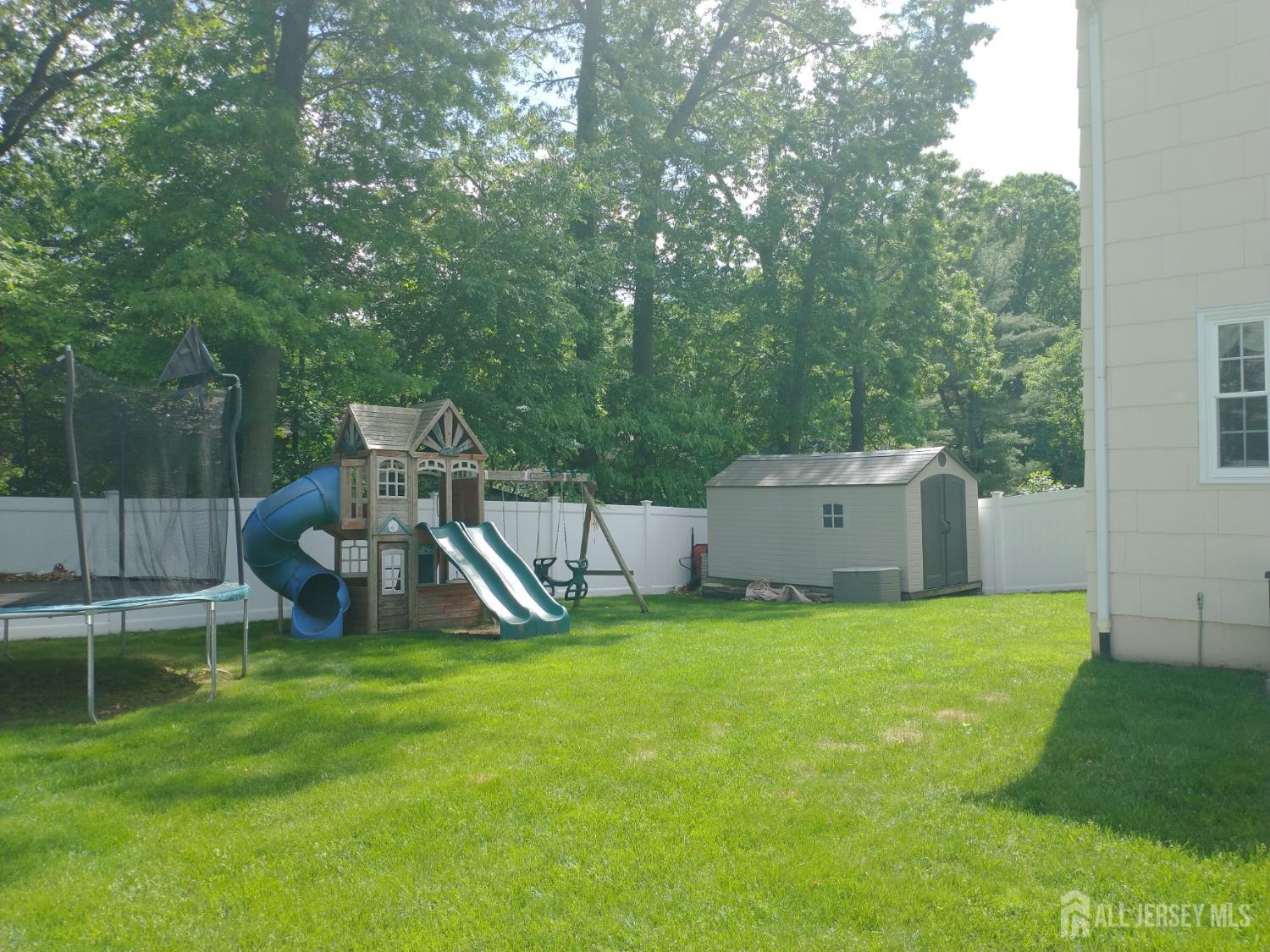 18 Timber Road East Brunswick, NJ 08816 - Photo 32 of 38 a view of a house with a park