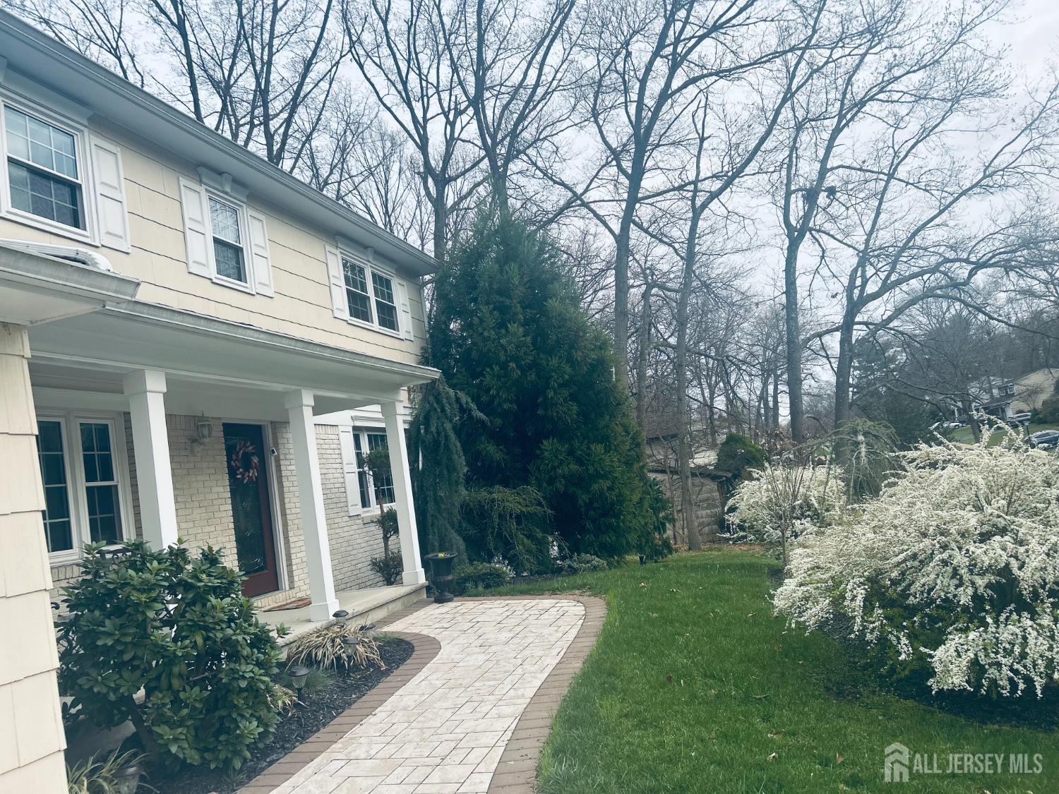 18 Timber Road East Brunswick, NJ 08816 - Photo 36 of 38 a front view of a house with garden