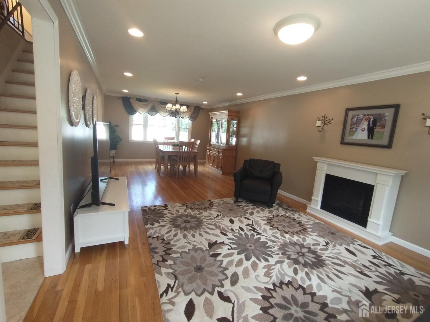 18 Timber Road East Brunswick, NJ 08816 - Photo 5 of 38 a lobby with a couch and a rug