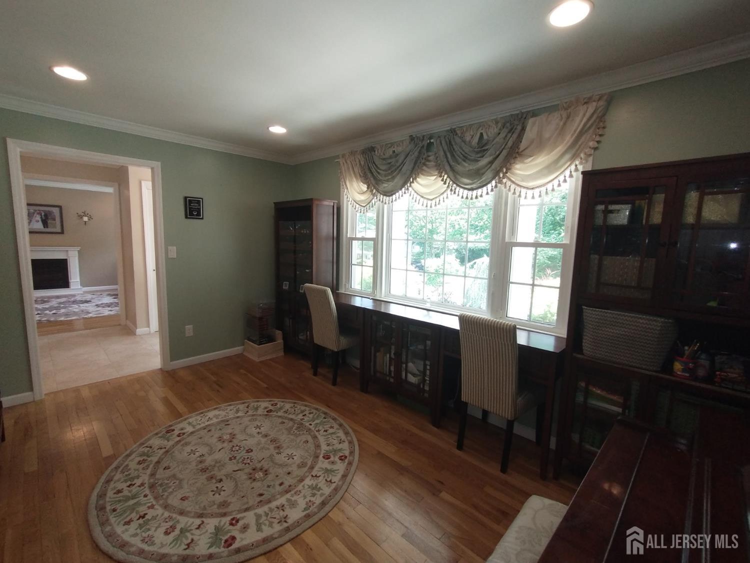 18 Timber Road East Brunswick, NJ 08816 - Photo 9 of 38 a living room with a couch and a table