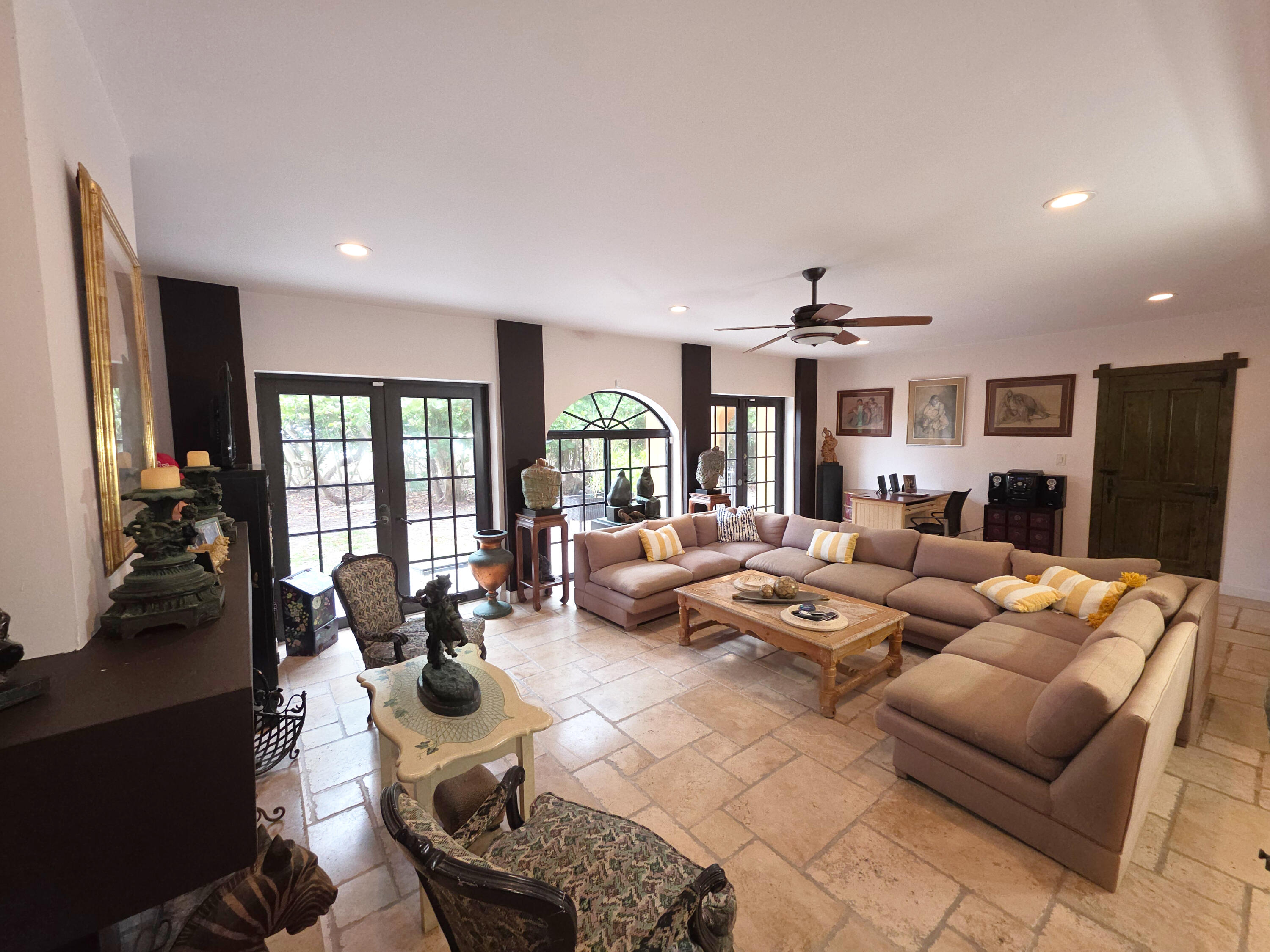 4200 North Surf Road Hollywood, FL 33019 - Photo 12 of 33 a living room with furniture fireplace and large windows