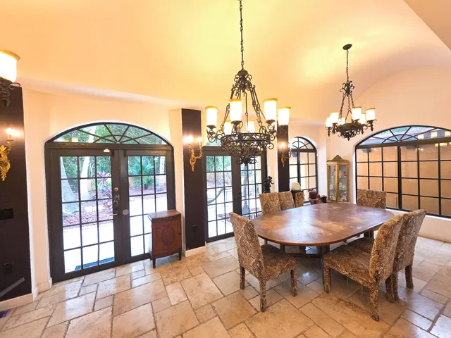 a kitchen with stainless steel appliances granite countertop a stove and a sink