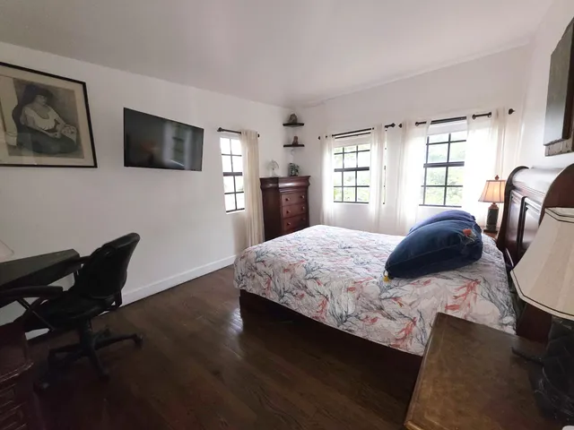 a bathroom with a toilet a sink and a bathtub