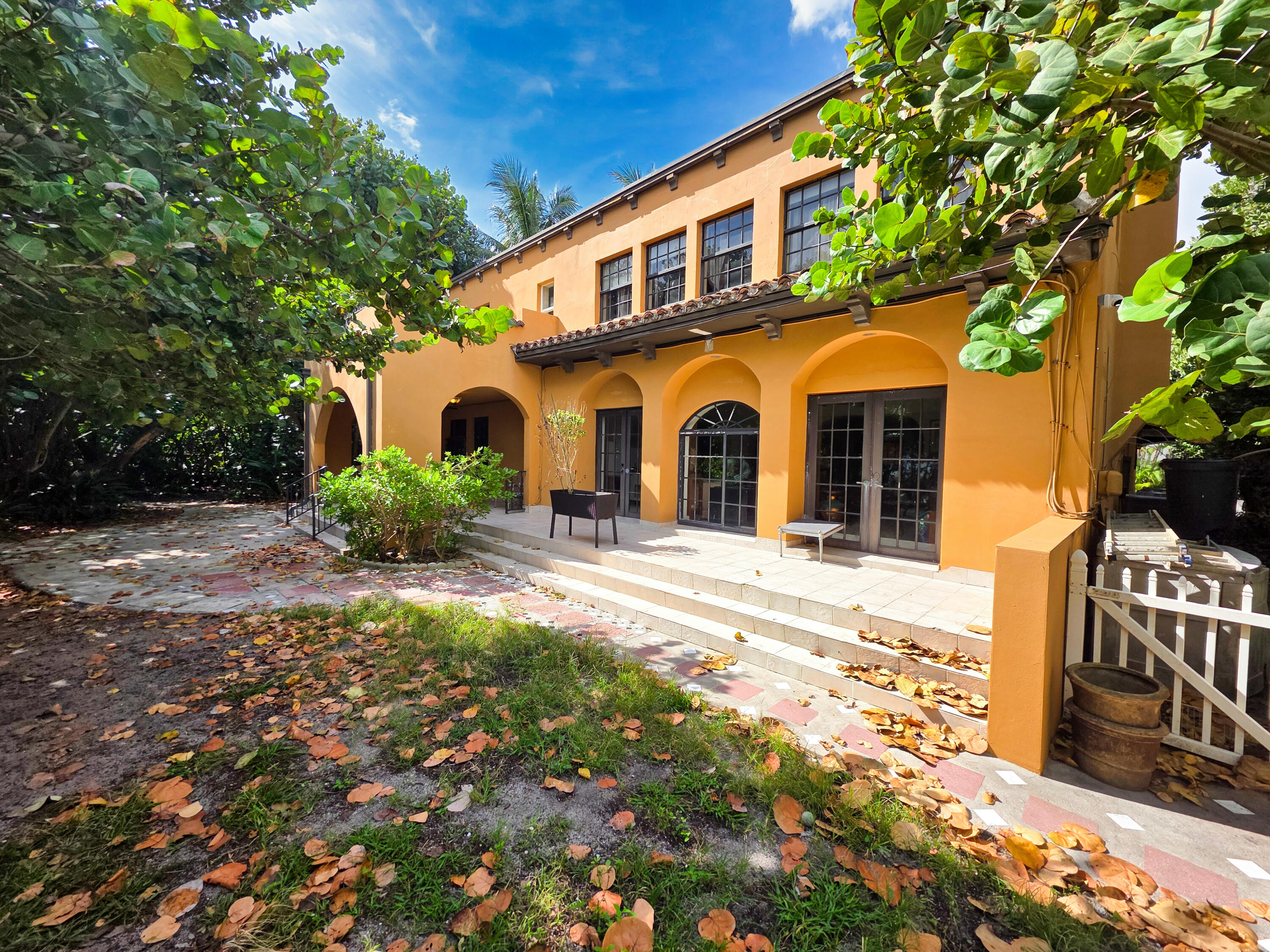 4200 North Surf Road Hollywood, FL 33019 - Photo 3 of 33 a front view of a house with a yard