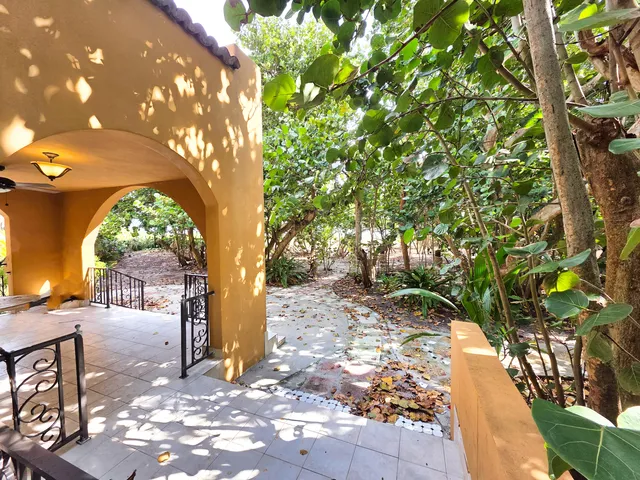 a view of swimming pool with a yard