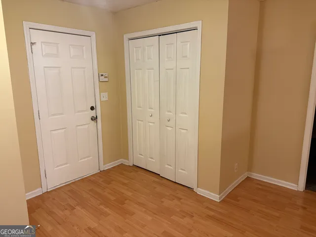a view of a livingroom with wooden floor