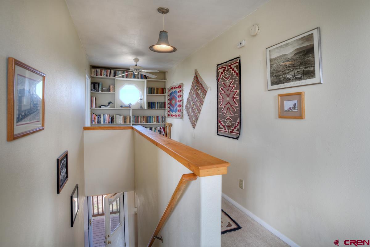 177 Sundance Hills Road Durango, CO 81303 - Photo 27 of 35 a view of a hallway with seating area