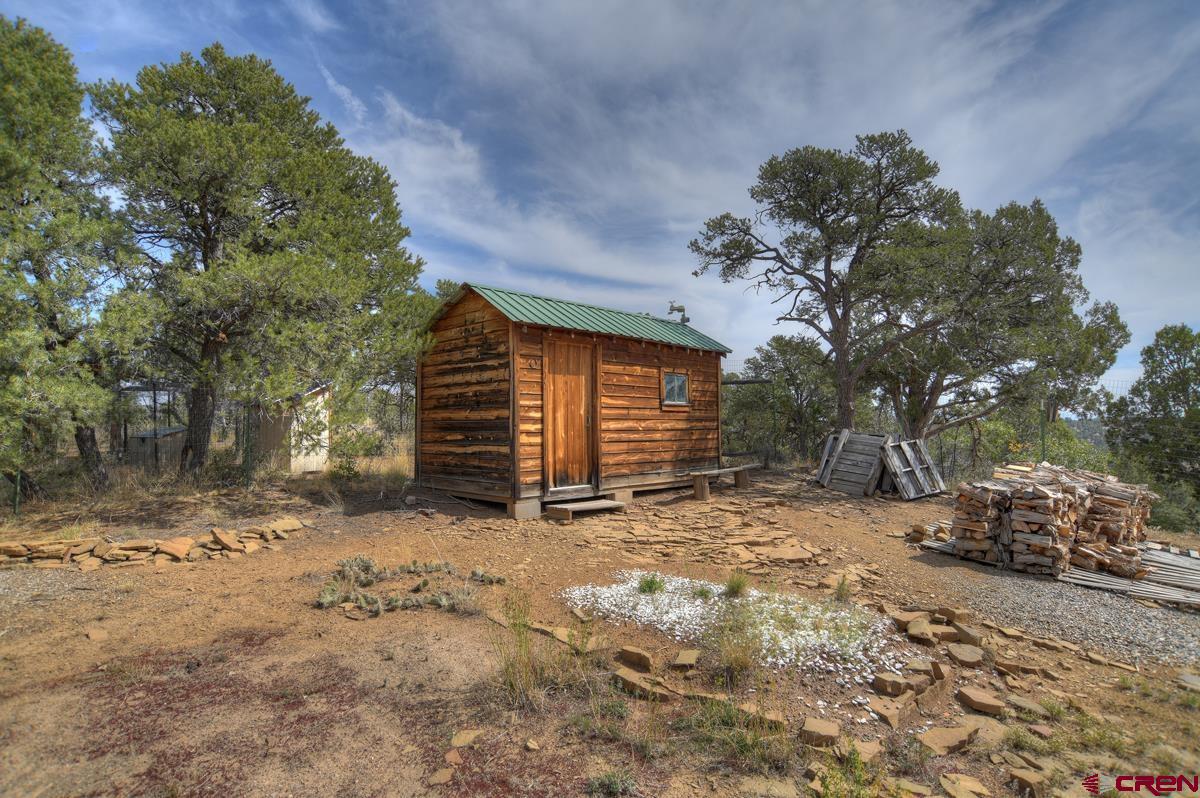 177 Sundance Hills Road Durango, CO 81303 - Photo 33 of 35 a view of a house with a snow