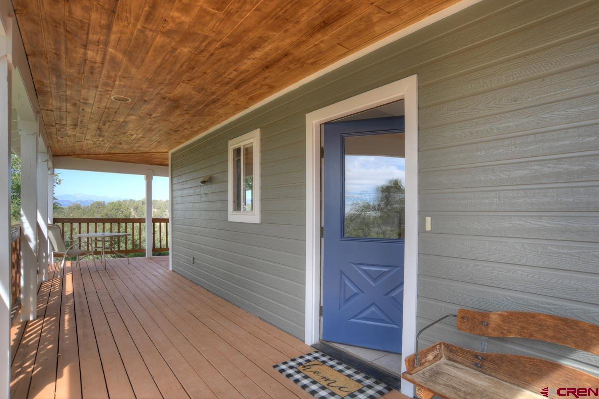 177 Sundance Hills Road Durango, CO 81303 - Photo 9 of 35 a view of balcony with wooden floor