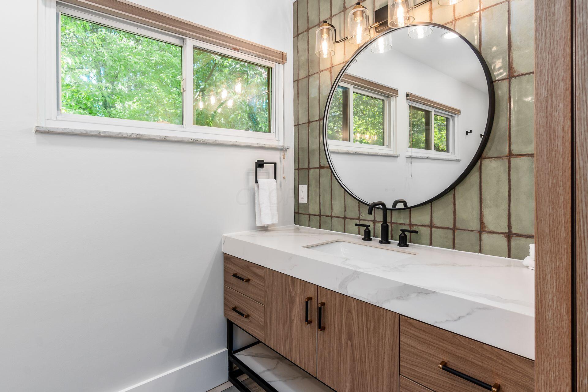 4610 Red Bank Road Galena, OH 43021 - Photo 38 of 88 Master bath features dual vanities each with storage and back-lit mirror, tile flooring, custom circular shower/bath combo.