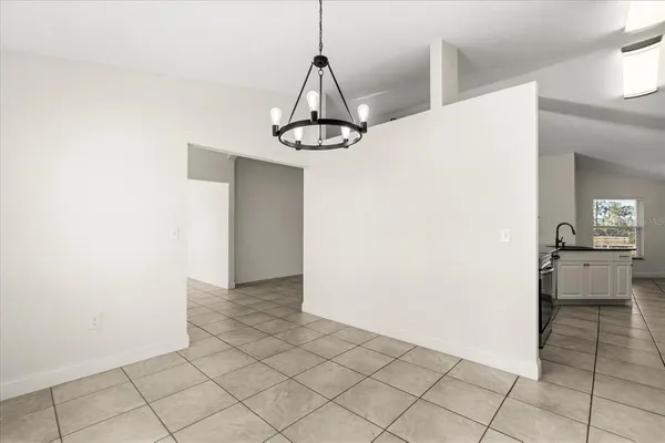 a view of a kitchen with kitchen and granite countertop cabinets