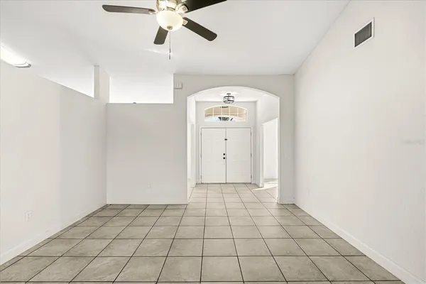 a view of an empty room and window