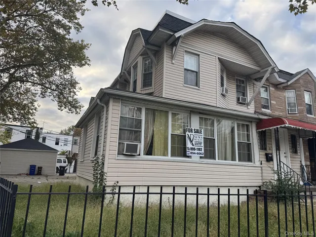 a front view of a house with a porch