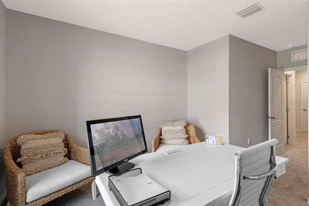 2729 Gladiola Road Winter Haven, FL 33884 - Photo 15 of 25 a living room with furniture and a window