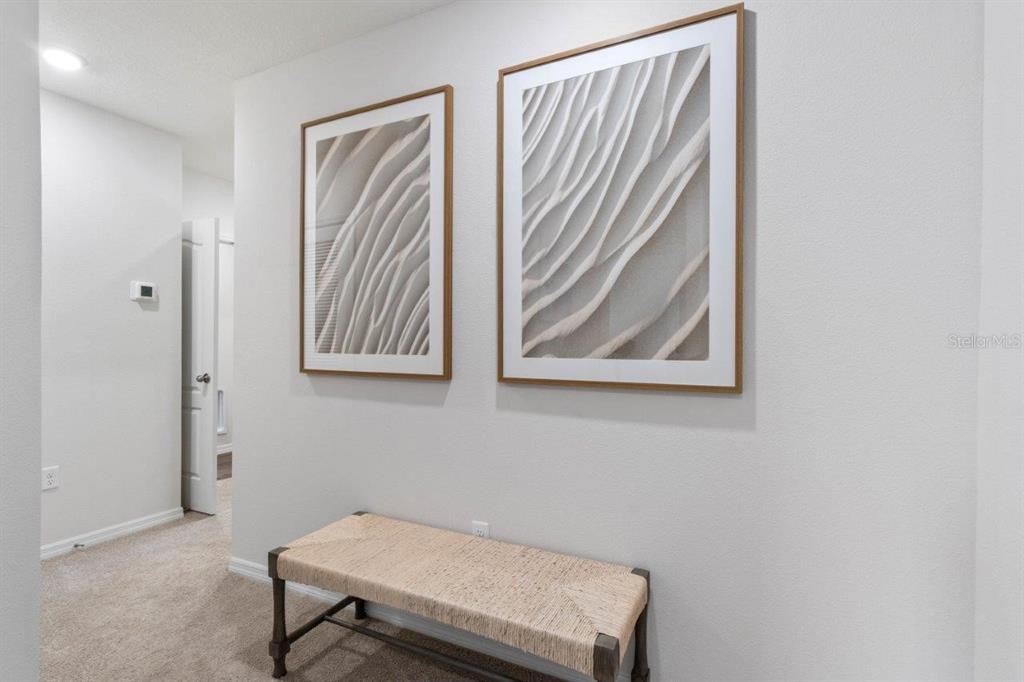 2729 Gladiola Road Winter Haven, FL 33884 - Photo 25 of 25 a bench sitting in a room next to a window