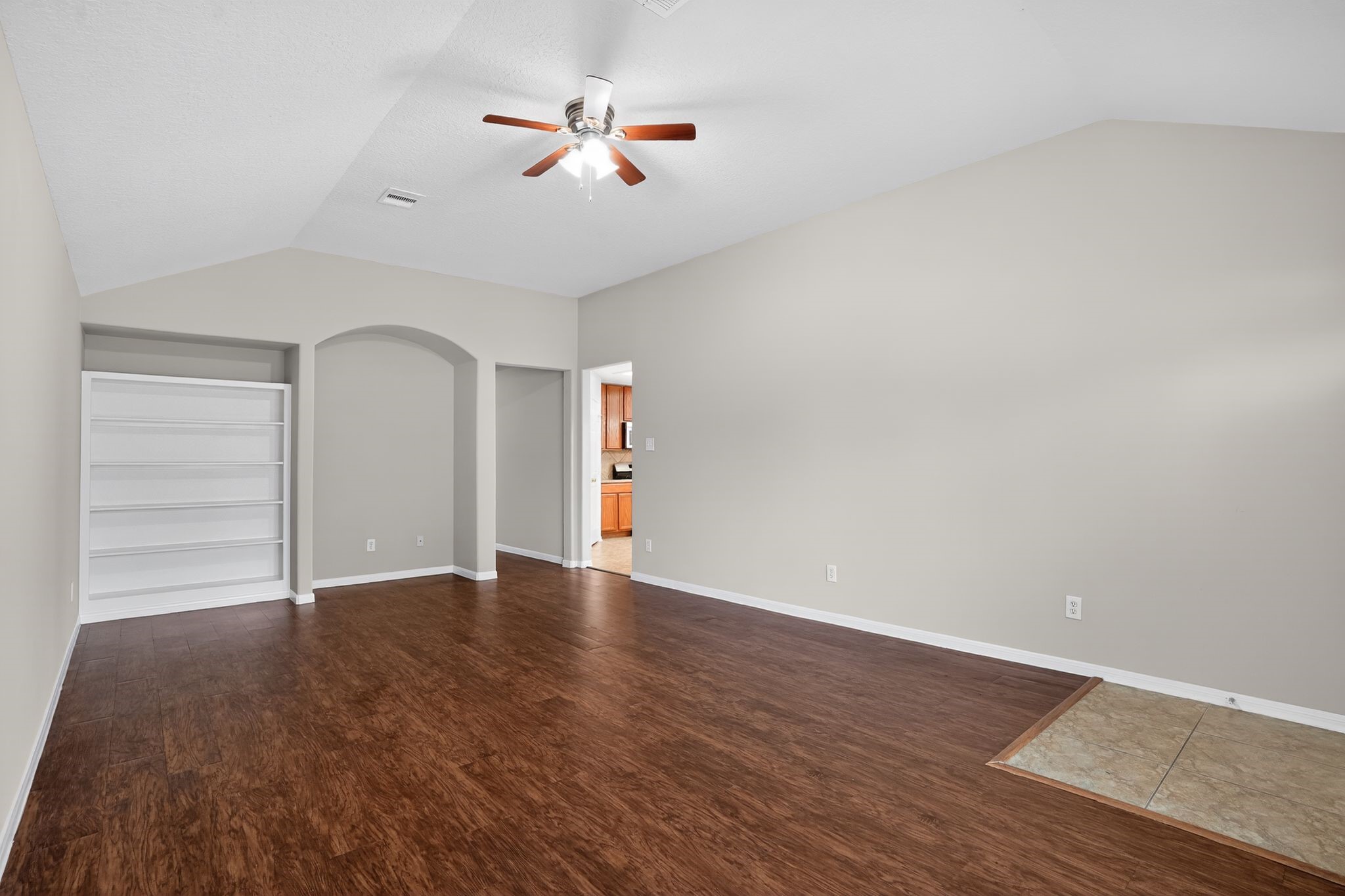 29414 Winton Wood Way Spring, TX 77386 - Photo 24 of 35 a view of an empty room with a window and wooden floor