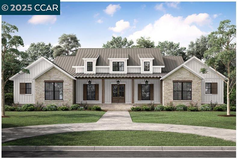 a front view of a house with a garden