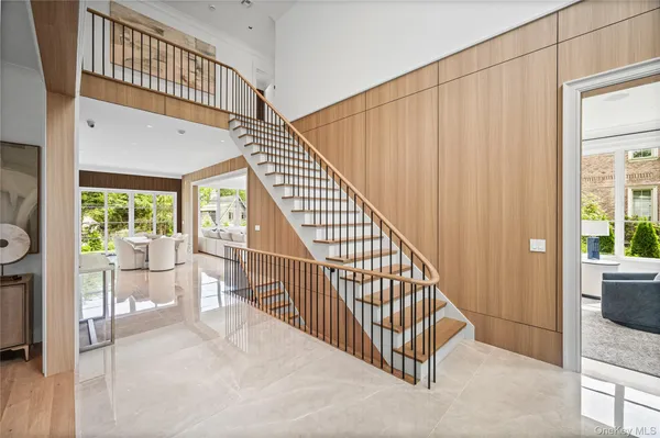 a view of staircase with furniture