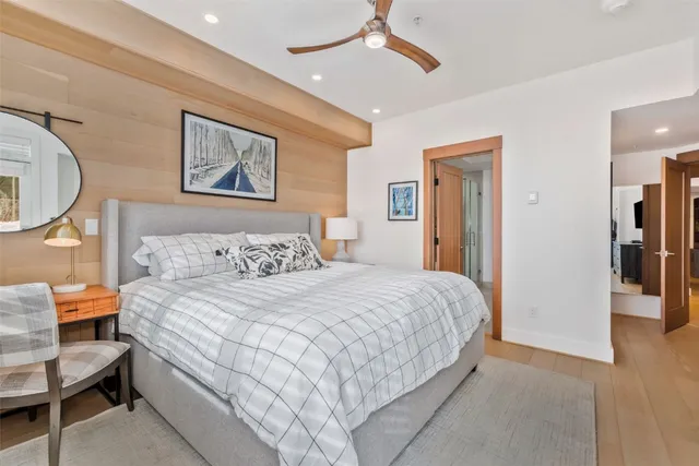 a bathroom with a double vanity sink and mirror