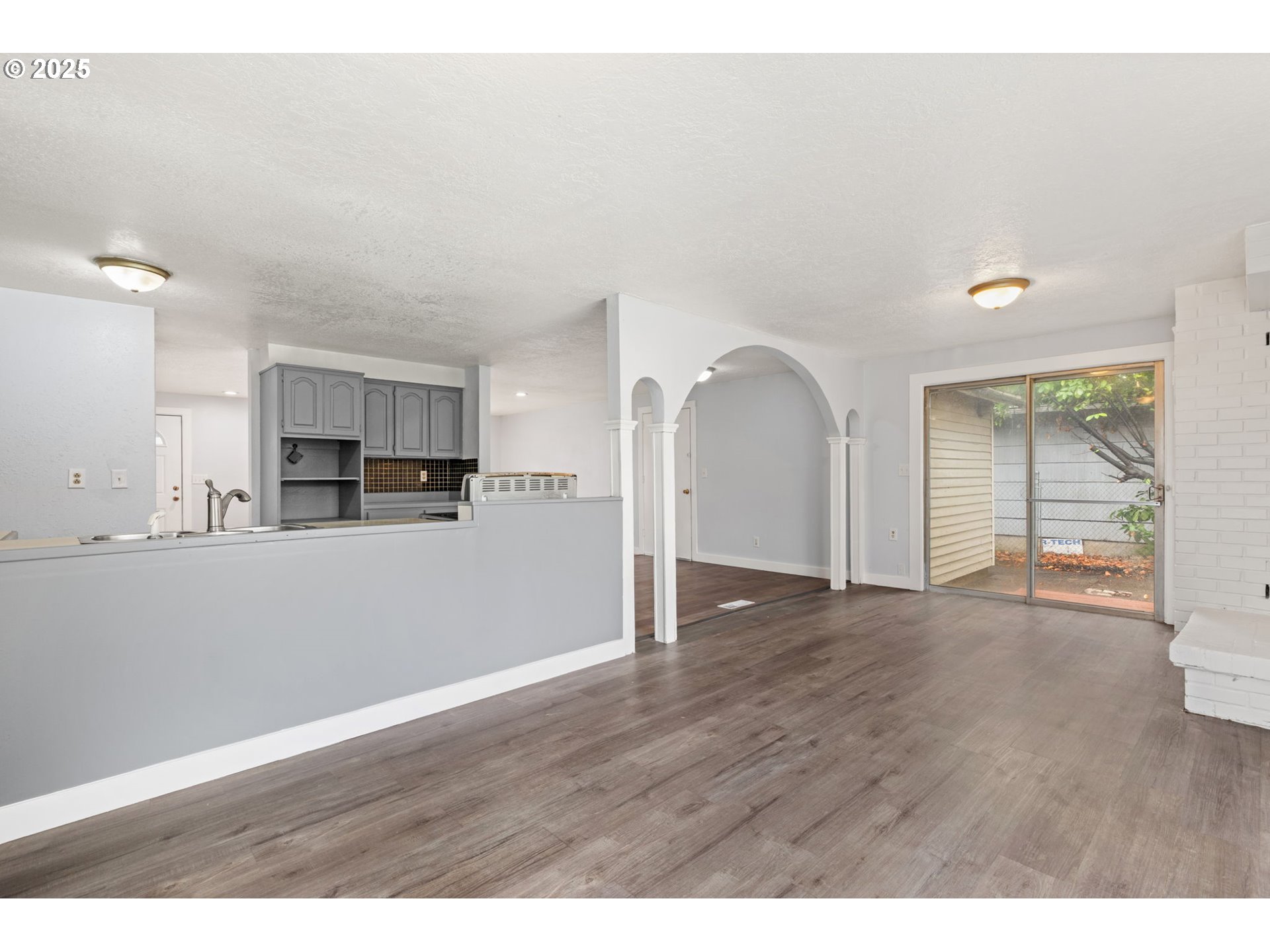 1203 Northeast 190th Place Portland, OR 97230 - Photo 11 of 48 a view of kitchen with wooden floor