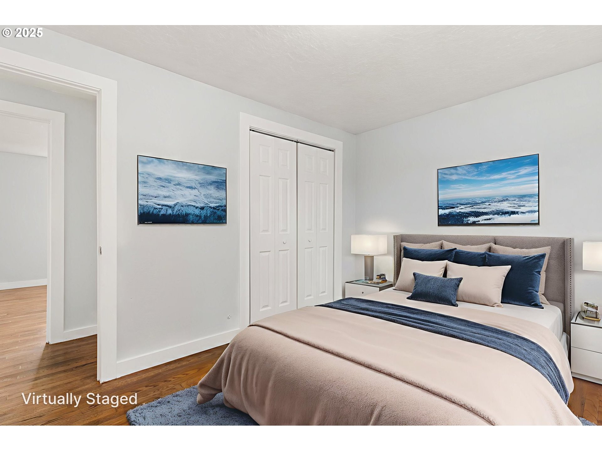 1203 Northeast 190th Place Portland, OR 97230 - Photo 24 of 48 a bedroom with a bed and a painting on the wall