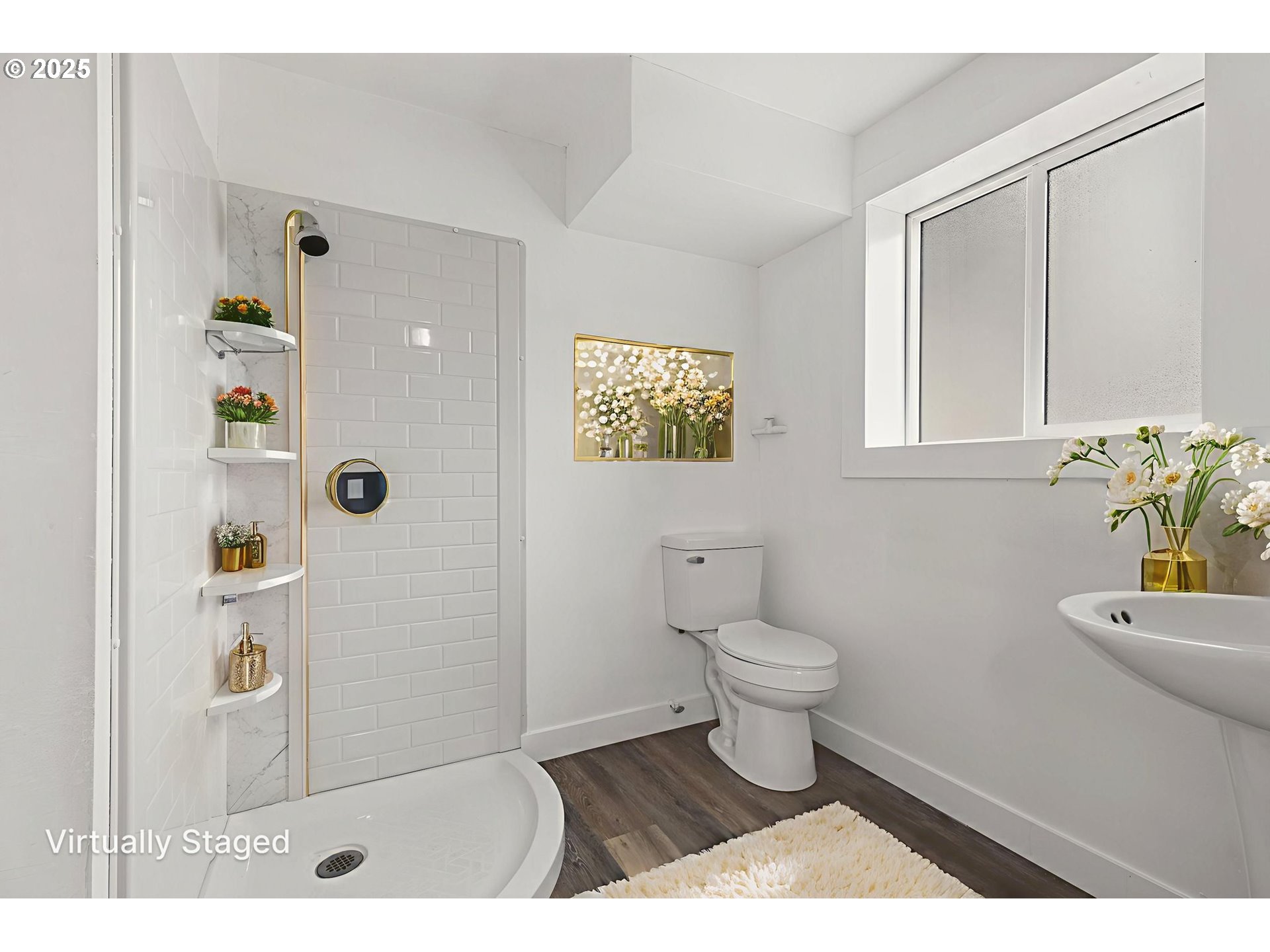 1203 Northeast 190th Place Portland, OR 97230 - Photo 42 of 48 a bathroom with a toilet a sink a shower and vanity