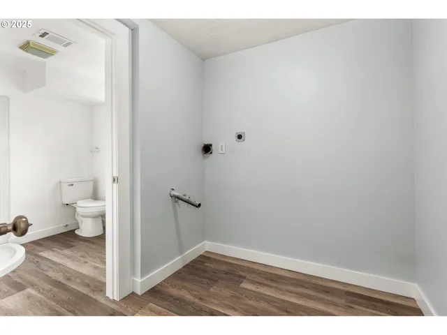 a view of bathroom and shower