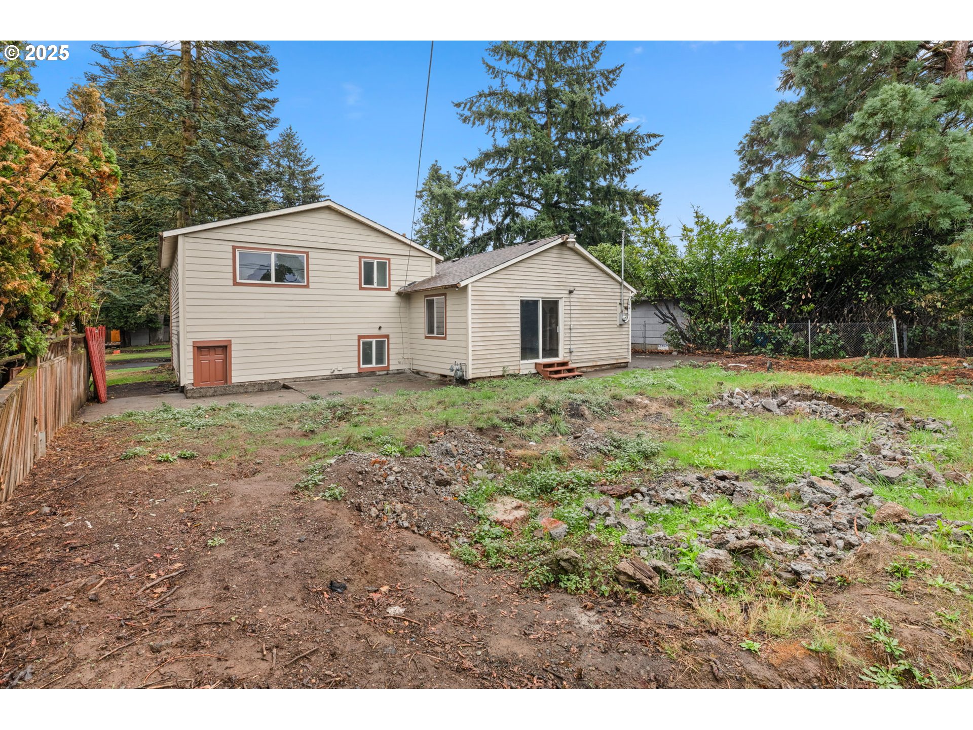 1203 Northeast 190th Place Portland, OR 97230 - Photo 46 of 48 a view of a house with a yard