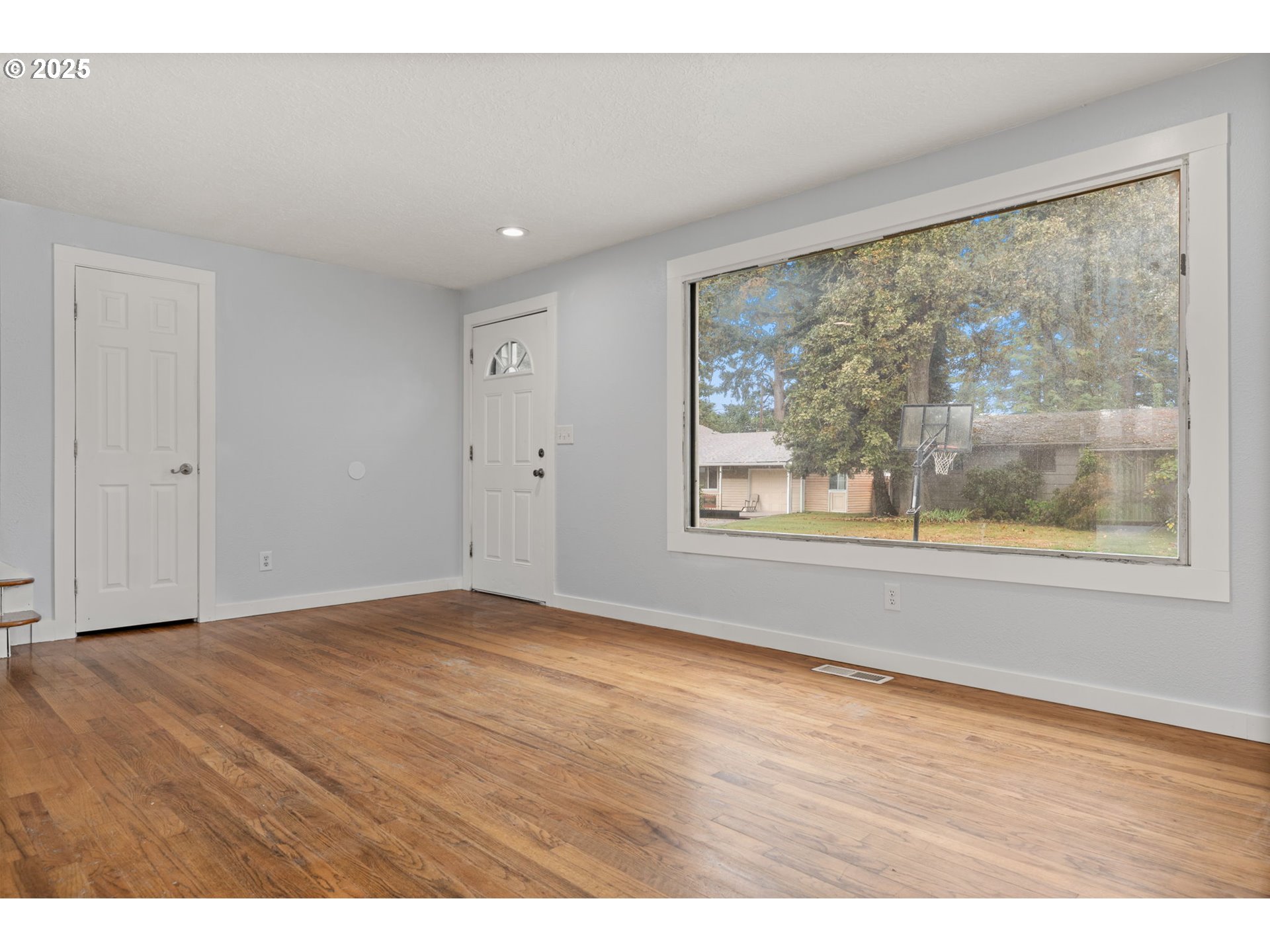 1203 Northeast 190th Place Portland, OR 97230 - Photo 7 of 48 a view of an empty room with window