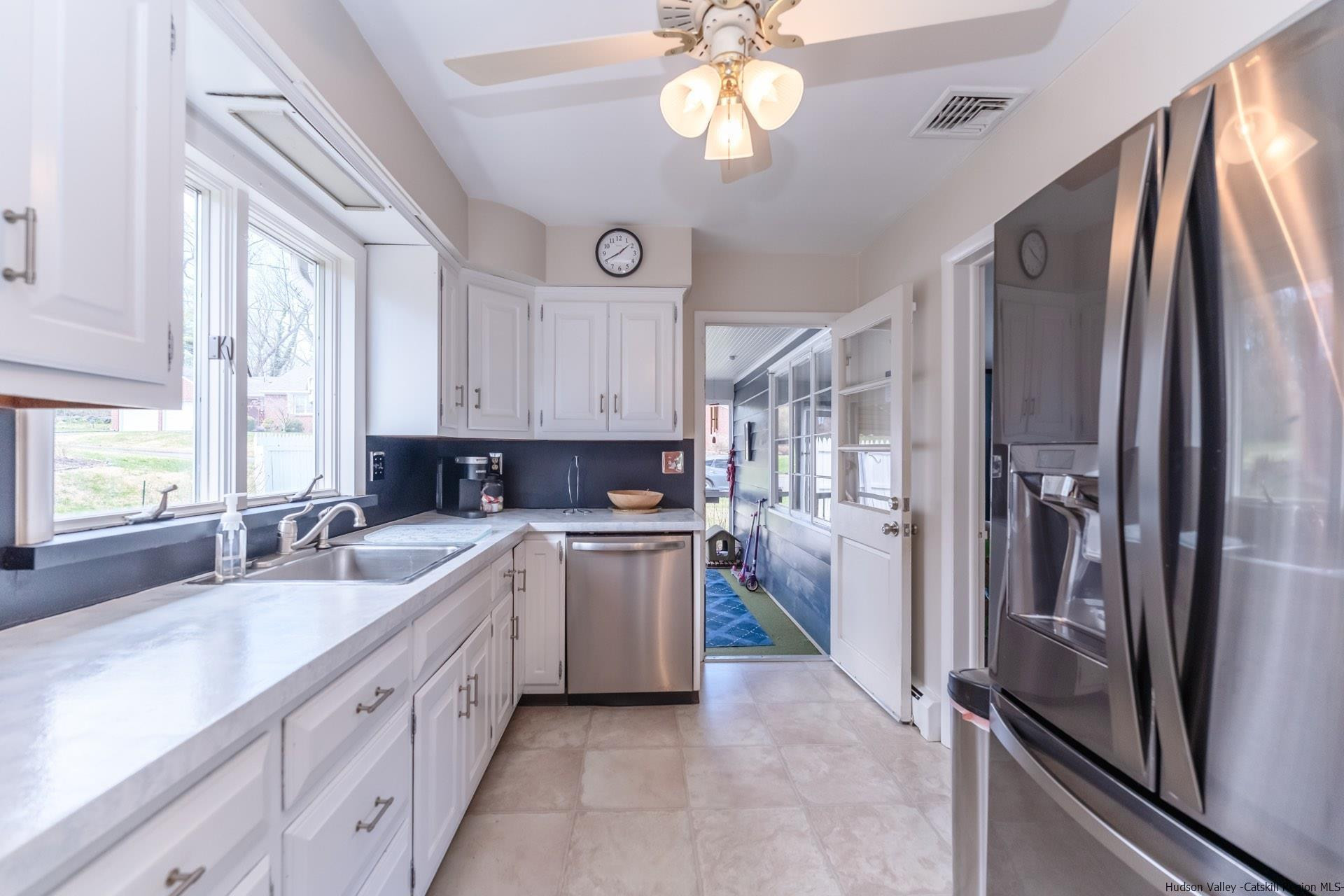 51 Sharon Lane Kingston, NY 12401 - Photo 13 of 29 a kitchen with a refrigerator and a sink