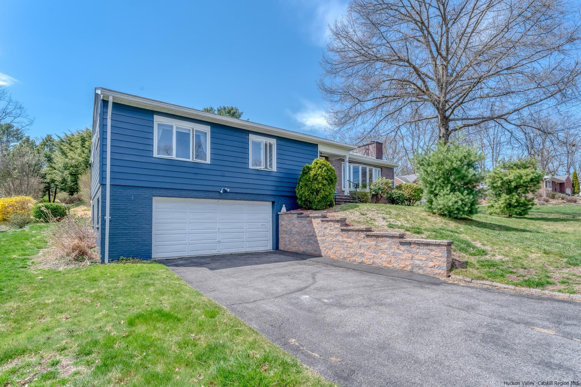 51 Sharon Lane Kingston, NY 12401 - Photo 28 of 29 a front view of a house with a yard and garage