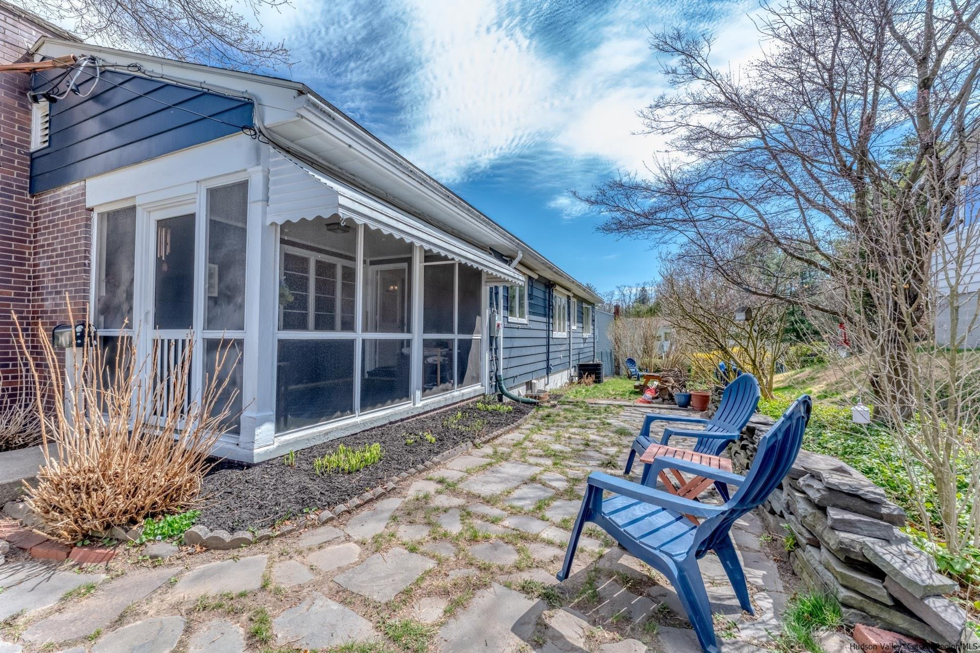 51 Sharon Lane Kingston, NY 12401 - Photo 29 of 29 a backyard of a house with table and chairs