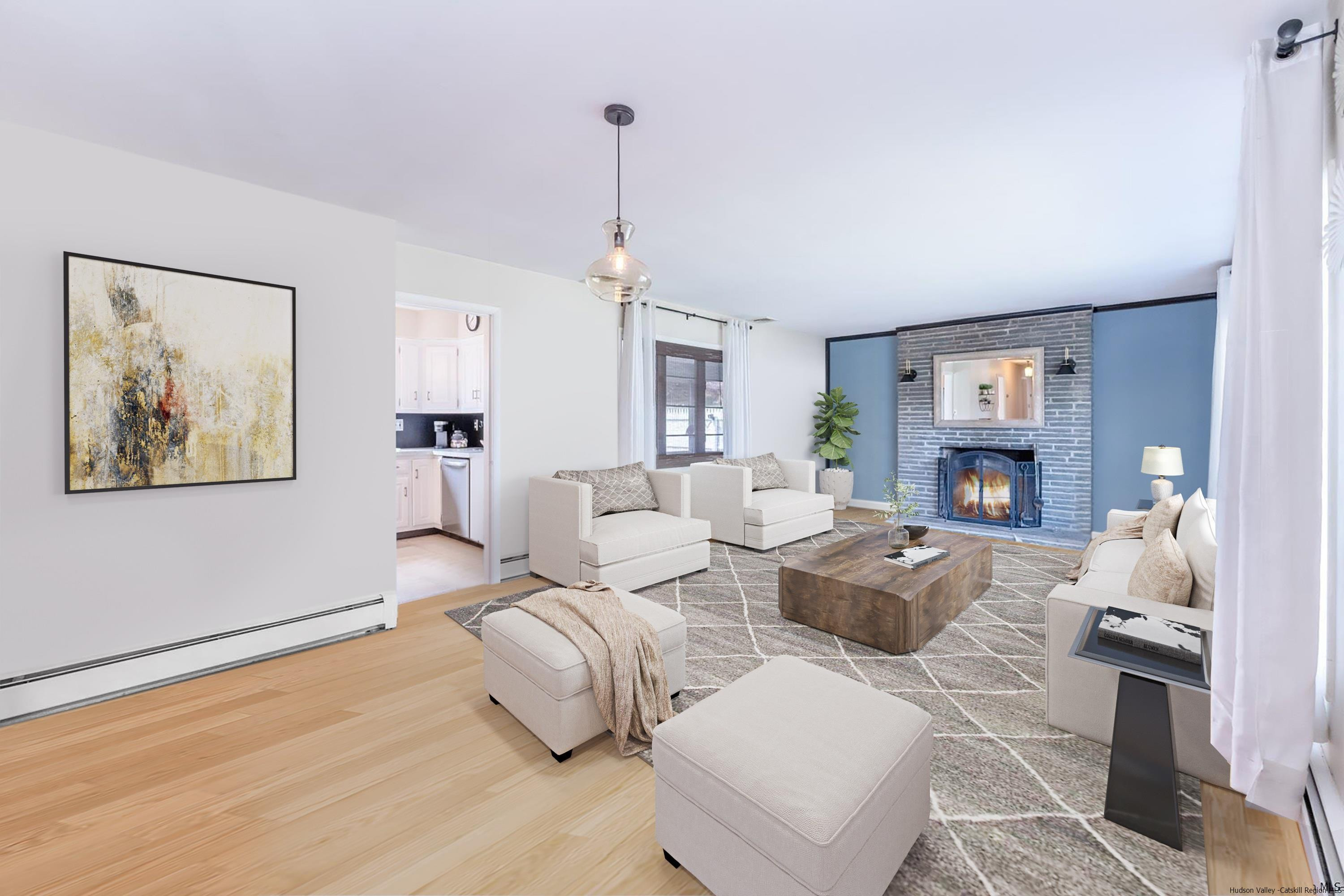 51 Sharon Lane Kingston, NY 12401 - Photo 6 of 29 a living room with fireplace furniture and a chandelier