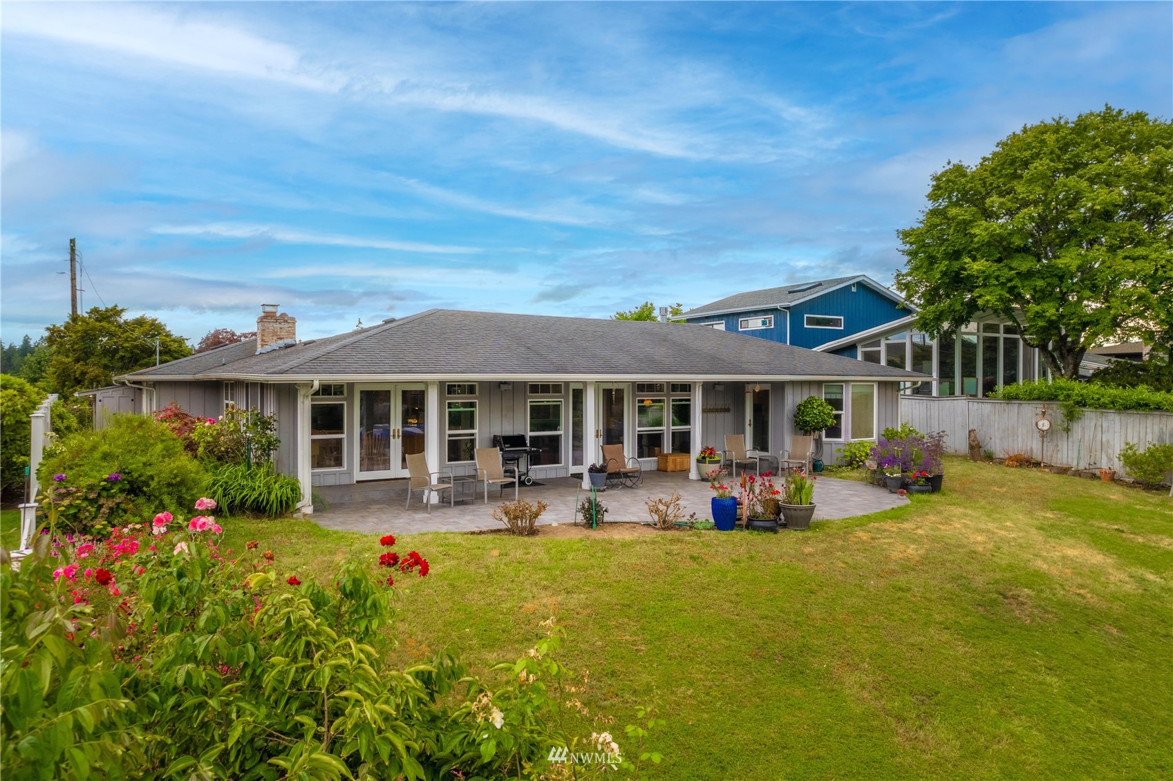 9215 Lake Steilacoom Point Road Southwest Lakewood, WA 98498 - Photo 11 of 36 a front view of a house with patio
