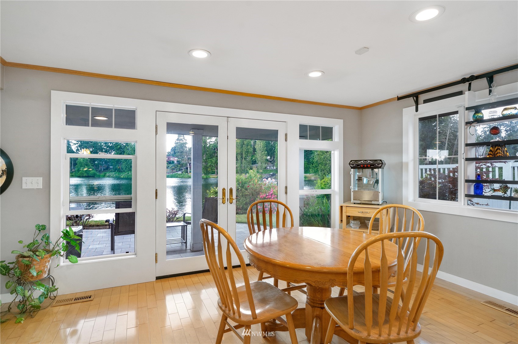 9215 Lake Steilacoom Point Road Southwest Lakewood, WA 98498 - Photo 15 of 36 a view of a dining room with furniture window and outside view