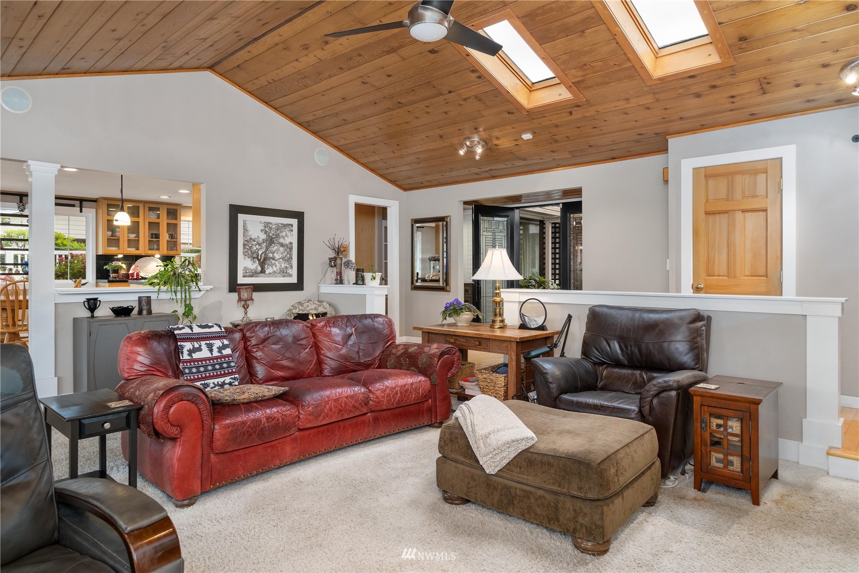 9215 Lake Steilacoom Point Road Southwest Lakewood, WA 98498 - Photo 26 of 36 a living room with furniture and a large window