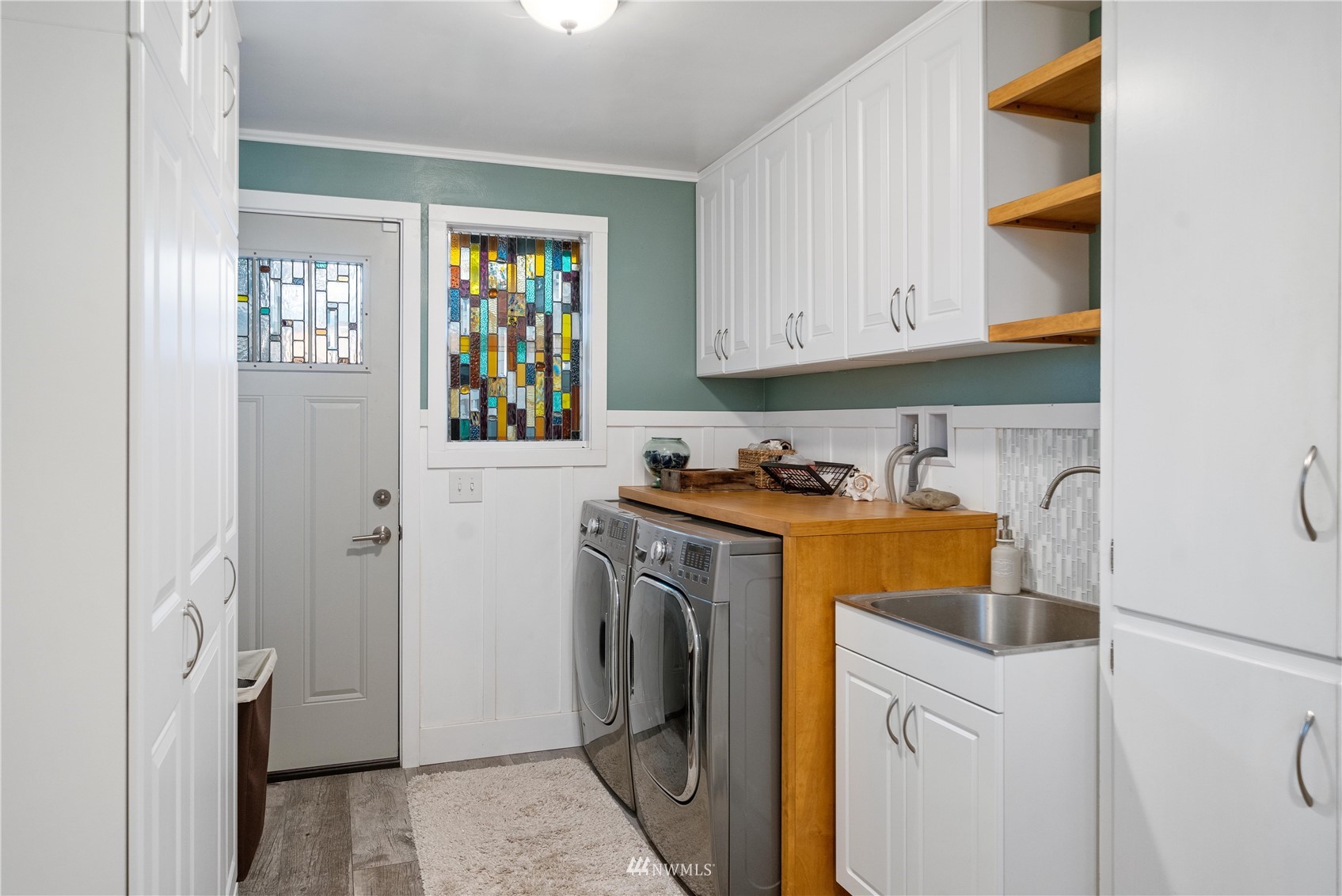 9215 Lake Steilacoom Point Road Southwest Lakewood, WA 98498 - Photo 29 of 36 a utility room with dryer and washer