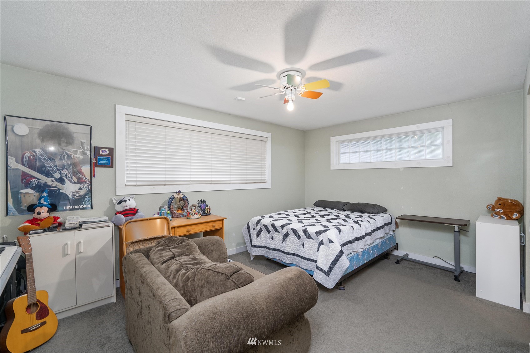 9215 Lake Steilacoom Point Road Southwest Lakewood, WA 98498 - Photo 35 of 36 a bedroom with two beds and a window