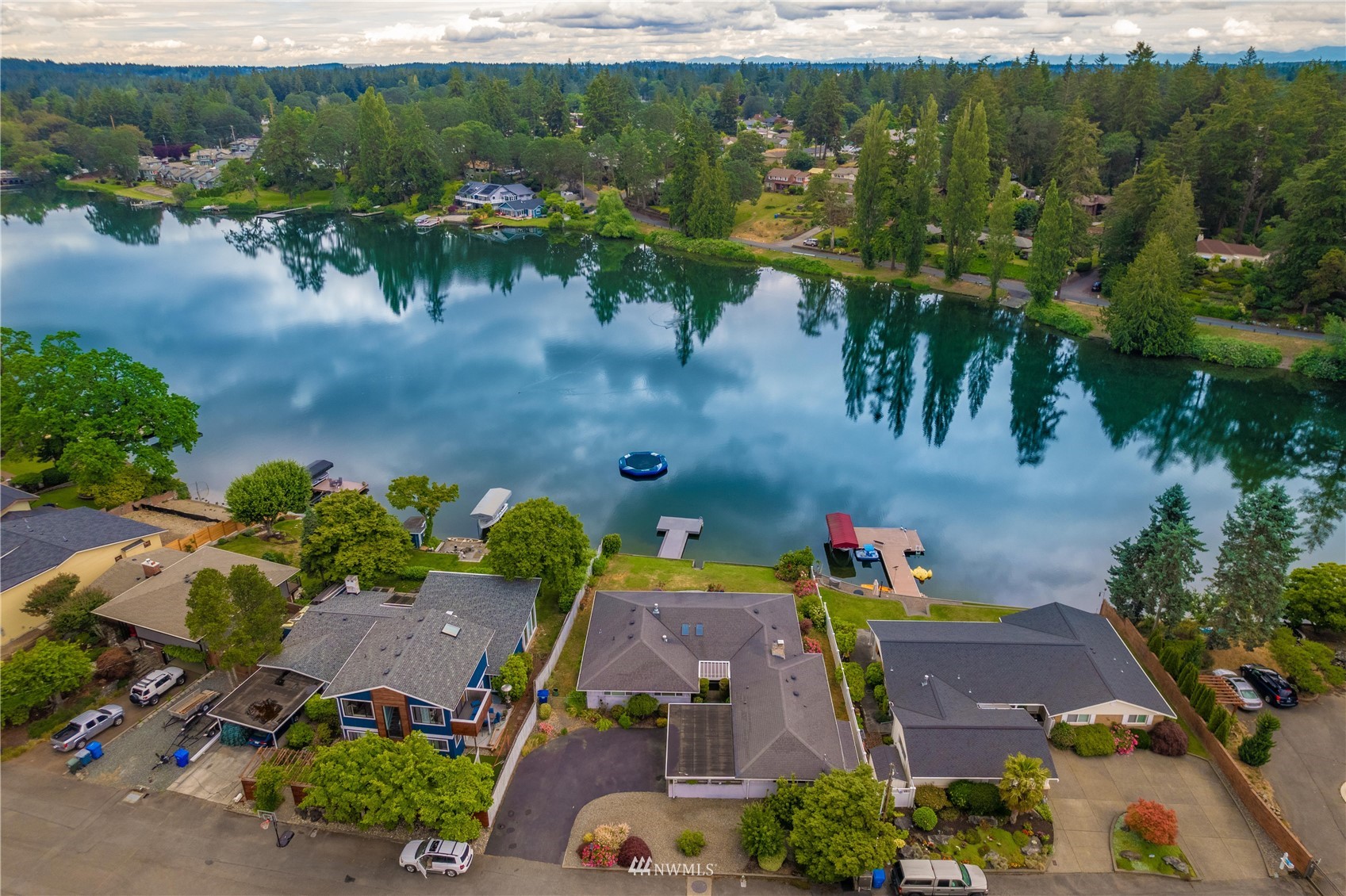 9215 Lake Steilacoom Point Road Southwest Lakewood, WA 98498 - Photo 4 of 36 an aerial view of a house with a yard