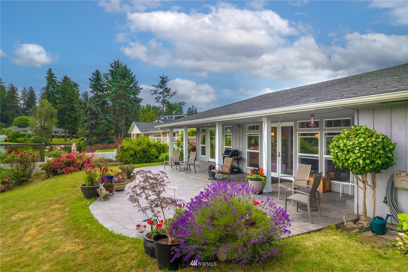 9215 Lake Steilacoom Point Road Southwest Lakewood, WA 98498 - Photo 8 of 36 a view of a porch with furniture