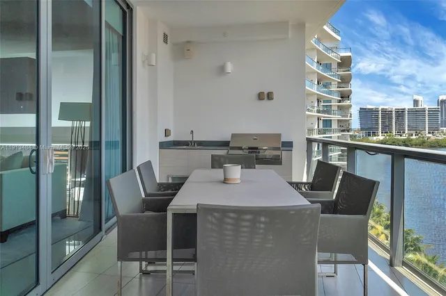 a dining table with chairs and wooden floor
