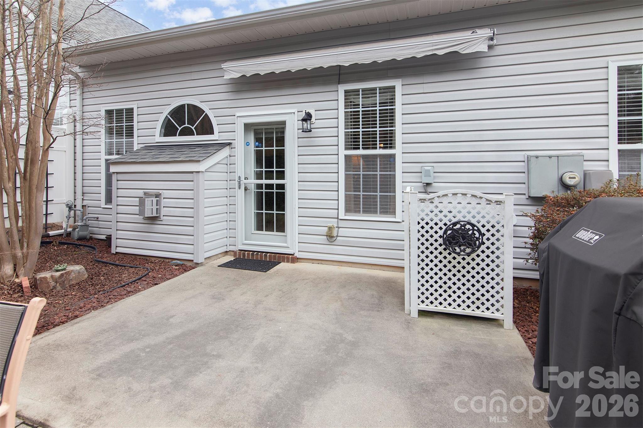 215 Garnet Court Fort Mill, SC 29708 - Photo 14 of 16 a front view of a house with a garage