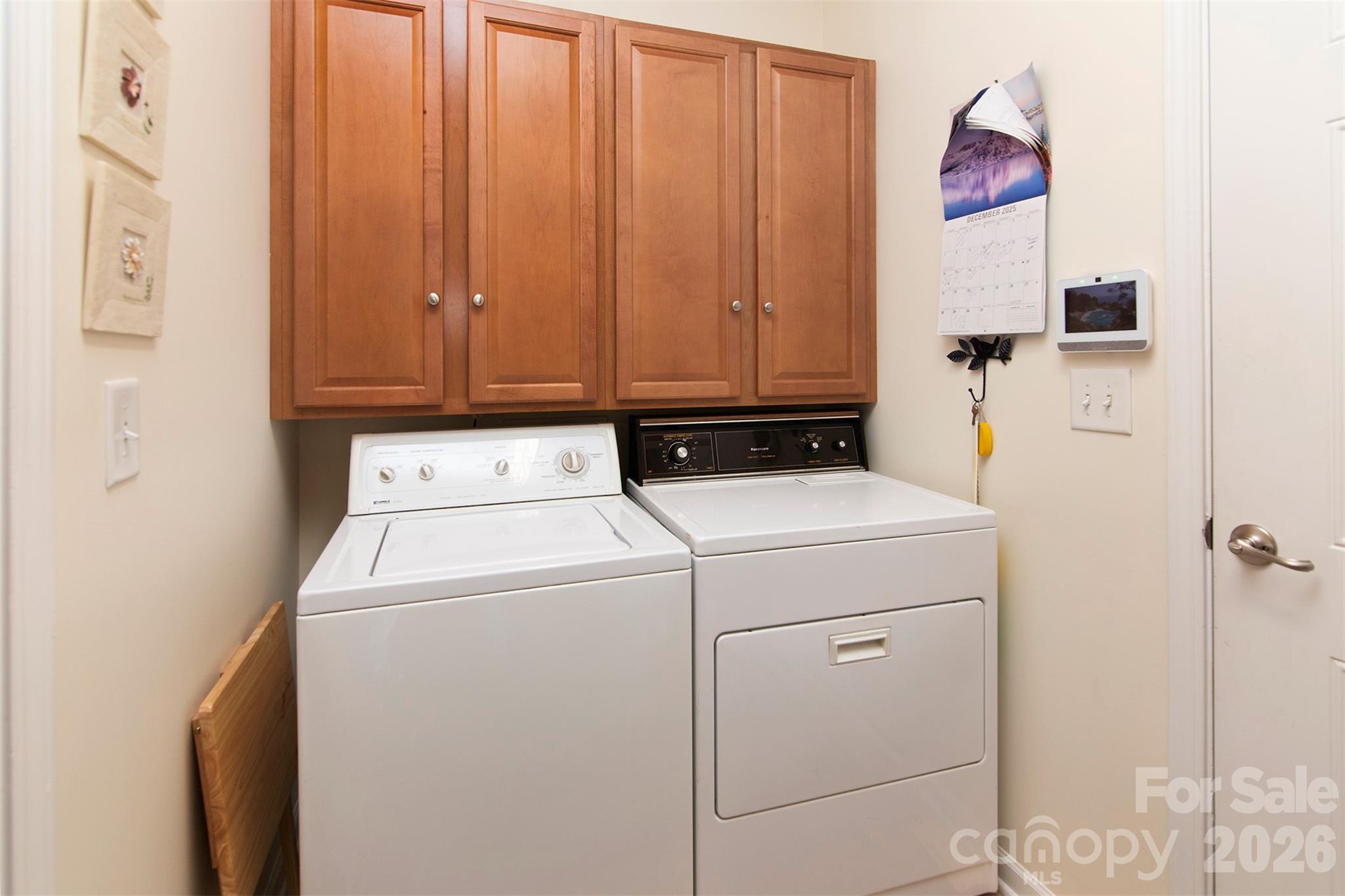 215 Garnet Court Fort Mill, SC 29708 - Photo 8 of 16 a utility room with dryer and washer