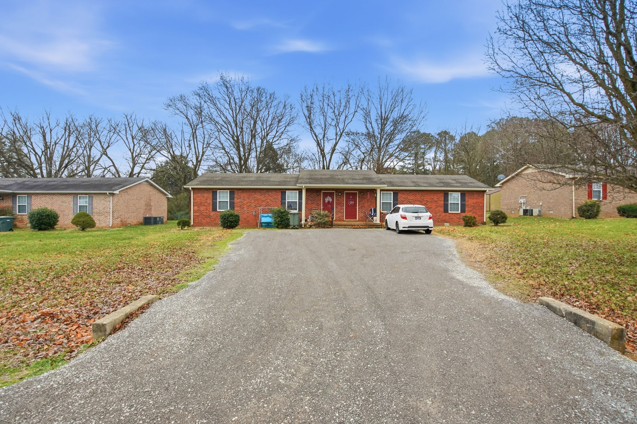 front view of a house with a yard