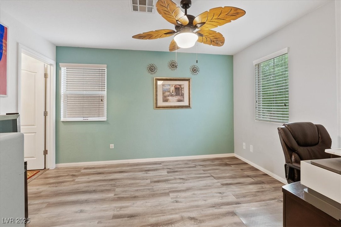9040 Magnetic Court Las Vegas, NV 89149 - Photo 16 of 43 Office space featuring light wood finished floors and a ceiling fan